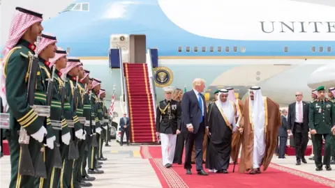 BANDAR ALGALOUD / SAUDI ROYAL COUNCIL / HANDOUT Donald Trump disembarks Air force one in Saudi Arabia