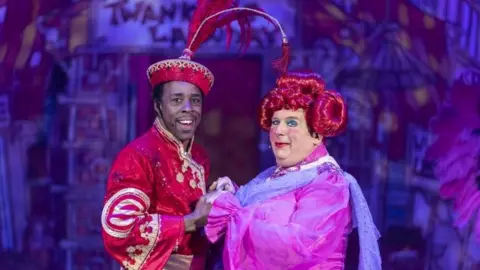 Luke Varley/Churchill Theatre Bromley Christopher Biggins as Widow Twankey in Aladdin at the Churchill Theatre in Bromley