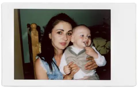 Jadwiga Bronte A polaroid photo of Alina and her son