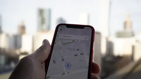Getty Images uber app in use