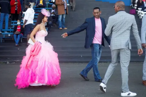 Reuters Punters arrive at Durban July horse racing event in Durban, South Africa, July 2, 2022.