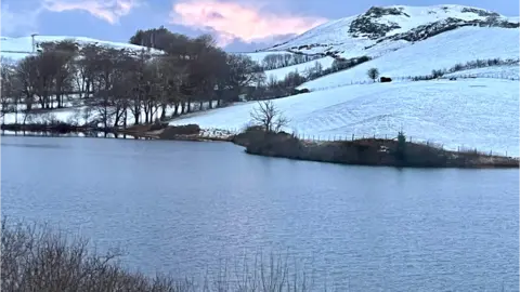 Lulu | BBC Weather Watchers Snowy hillside and lake at Devils Bridge, Ceredigion