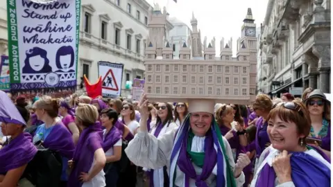 Reuters Woman in Parliament-shaped hat