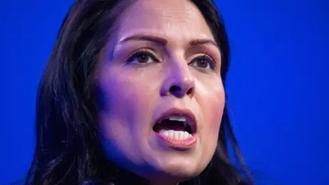 PA Media Priti Patel