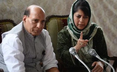 Getty Images Chief Minister of Jammu and Kashmir Mehbooba Mufti and India's Home Minister speaking at a press conference