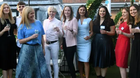 CommsCo Ilona Hitel with some of her team at a recent social event