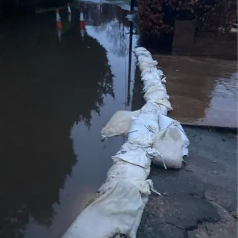 Victoria Cooper Flooding outside Victoria Cooper's house