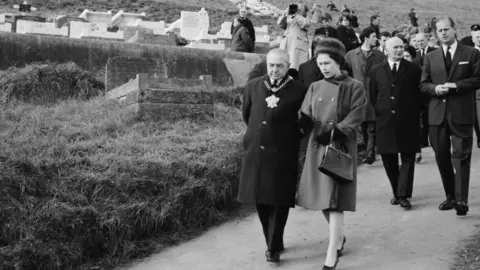 Getty Images The Queen and Prince Philip visit Aberfan in October 1966