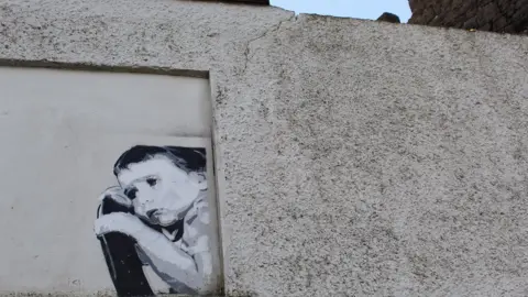 Banksy-style street art in Portstewart