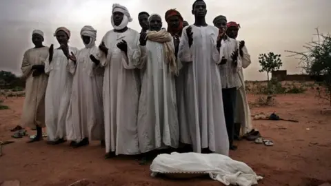 Getty Images Relatives mourn the death of an infant, who died as a result of malnutrition (Getty Images)