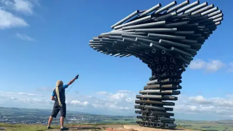 Paul Cheese Paul records at the Singing Ringing Tree sculpture near Burnley