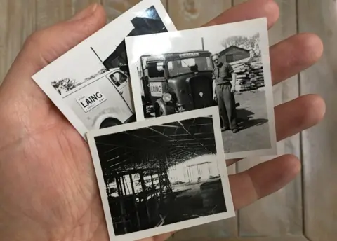 Lloyd Sluman Small photographs in Lloyd Sluman's hand