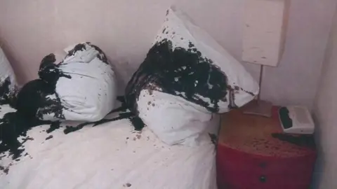 Avon and Somerset Police Acid stains on bed
