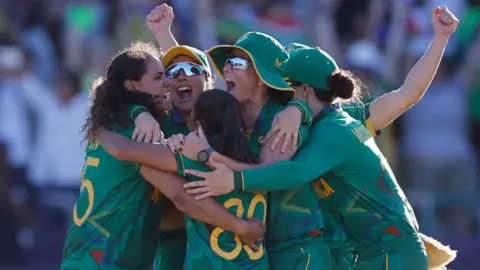 AFP South African female cricketers celebrating at Newlands Stadium in Cape Town, South Africa - Friday 24 February 2023