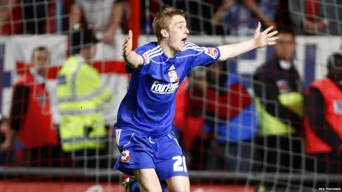 Rex Features Stephen Darby celebrates scoring a penalty for Swindon