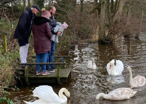 Tom White Ralph White with his wife, Lynn, son Tom, and granddaughter Penny.
