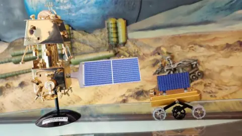 Getty Images A scale model of the Indian lunar craft Chandrayaan 2 on display as Dr K Sivan, Chairman of the Indian space agency, widely known as the Rocket Man of India celebrates the successful lift off of the Chandrayaan-2 satellite at a press meet on August 20, 2019 in Bengaluru, India