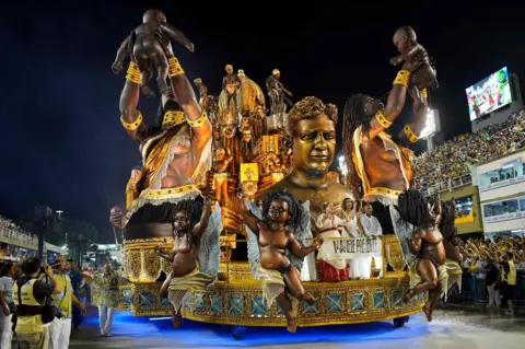 AFP Anielle Silva (2-R), sister of murdered council woman Marielle Franco, takes part in the Vila Isabel samba school parade during the second night of Rio"s Carnival parade at the Sambadrome in Rio de Janeiro, Brazil on March 4, 2019