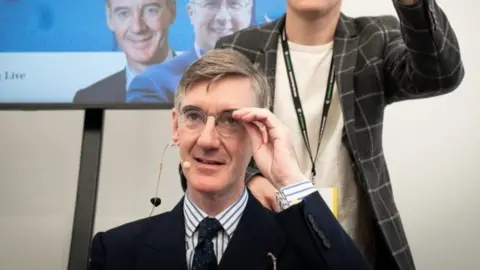 PA Media Business Secretary Jacob Rees-Mogg at the Conservative Party annual conference