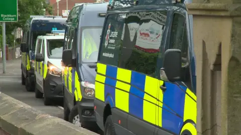 row of police vans