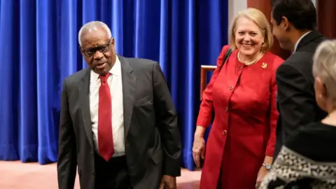 Getty Images Virginia Thomas with her husband, Supreme Court Judge Clarence Thomas