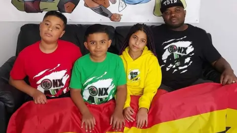 Family R-L: Eric, Ebony, Jacob, Isaac Ohene-Adjei