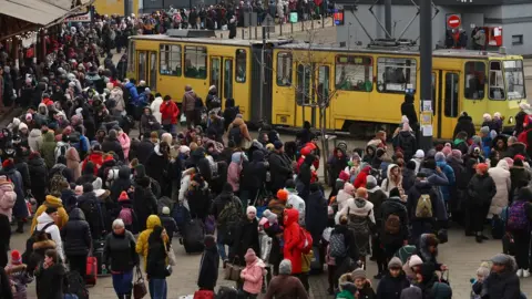 Reuters/KAI PFAFFENBACH Thousands of refugees have been travelling via Poland on to other European countries