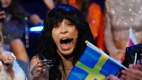 Aaron Chown / PA Media Sweden entrant Loreen celebrates winning the Eurovision Song Contest