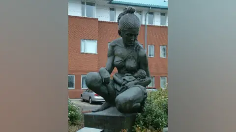 Peter Hodge/Geograph A statue of a mother and baby outside Liverpool Women's Hospital