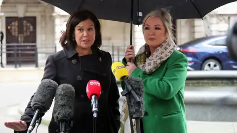 Pacemaker Mary Lou McDonald, left, and Michelle O'Neill outside the talks in Belfast