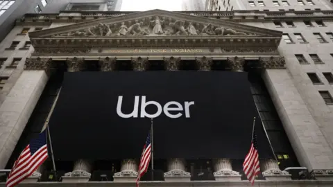 Getty Images Uber sign at the New York Stock Exchange