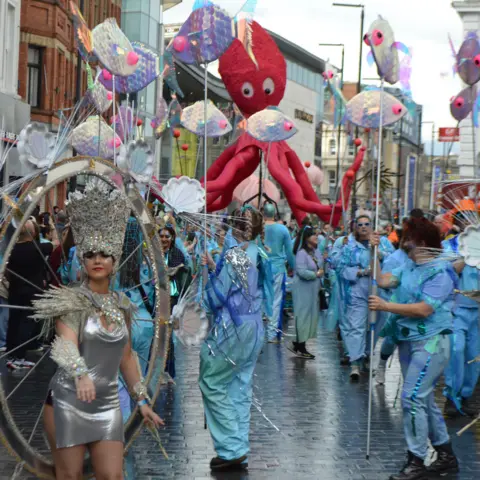 Dancers in the Blue and Yellow Submarine Parade, part of the Eurovision Festival in Liverpool