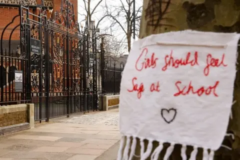 Reuters Sign on tree outside Highgate School