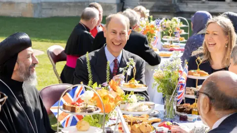 Reuters Duke of Edinburgh, alongside faith leaders, attends a Coronation Big Lunch, ahead of King Charles' coronation