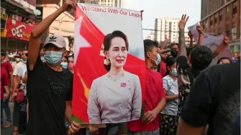 Reuters File photo of a protest against the military coup in Yangon in February