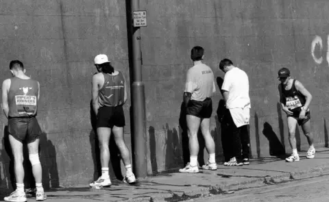 Alamy Marathon toilet queue