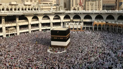 Reuters Pilgrims gather around Kaaba at Hajj