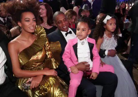 Getty Images Blue Ivy with her Dad Jay-Z and auntie Solange