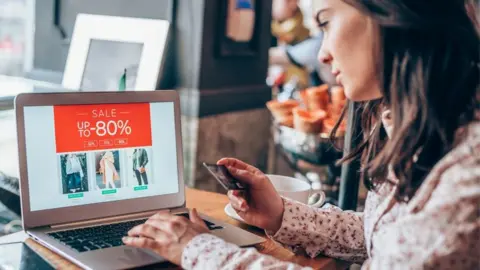 Getty Images Woman shopping online