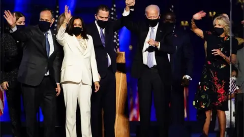 Reuters Kamala Harris on stage with Joe Biden