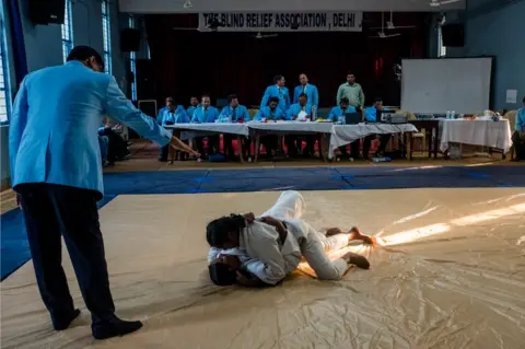 Arko Datto / Noor / Sightsavers Two girls wrestle