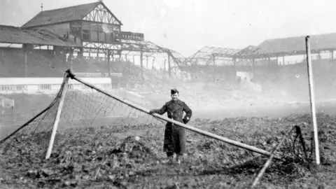 Picture Sheffield Bramall Lane football ground after World War Two bombing