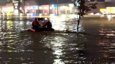 Rescue personnel operates, in this video screengrab, in Bedford, Nova Scotia