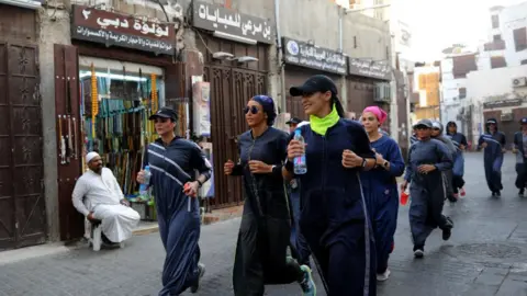 AFP women jog in Balad, Jeddah