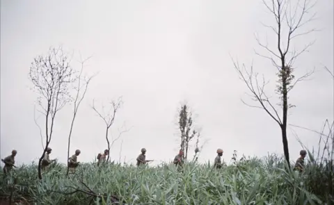 Swanson Photographic Archive, UT Austin  Squad of men on a patrol in Vietnam in 1969