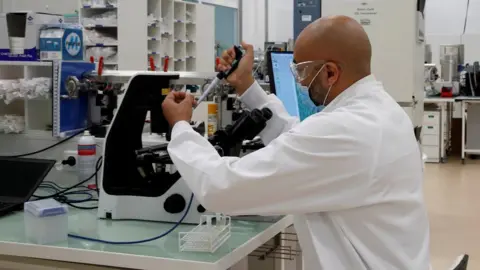 Reuters A researcher works in an industrial development laboratory at Sanofi's vaccine unit