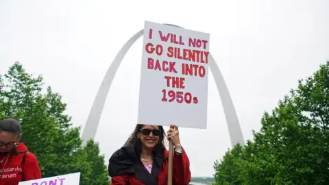 Reuters A woman holds up a sign as hundreds of women protest on the steps of the Old Court House during a Stop the Abortion Ban Bill Day of Action in St Louis, Missouri