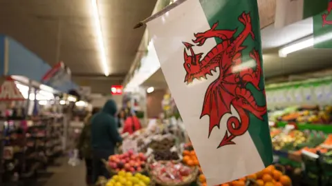 Getty Images A Welsh flag is displayed in the market in Aberdare