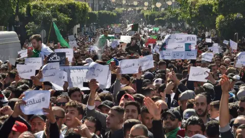 AFP Algerians take part in a protest against ailing President Bouteflika's bid for a fifth term in power, in the capital Algiers on 1 March 2019