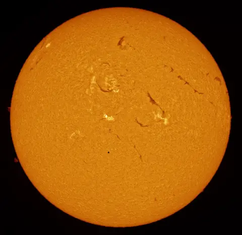 Alexandra Hart Mercury passing in front of the surface of the sun